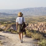 Woman walking to viewpoint near Uchisar, Cappadocia, Turkey